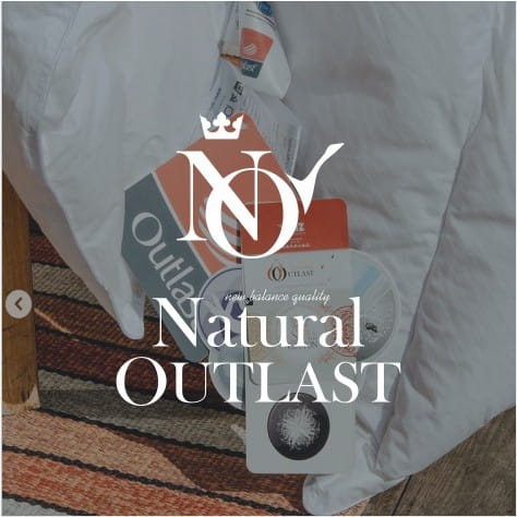 Kołdra NATURAL OUTLAST AMZ – logo na tle kołdry