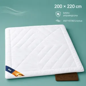 Kołdra zimowa DUO 200x220 ANTYSTRES Active AMZ na łóżku w sypialni